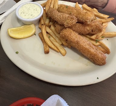 Fried fish and chips with lemon and tartar sauce